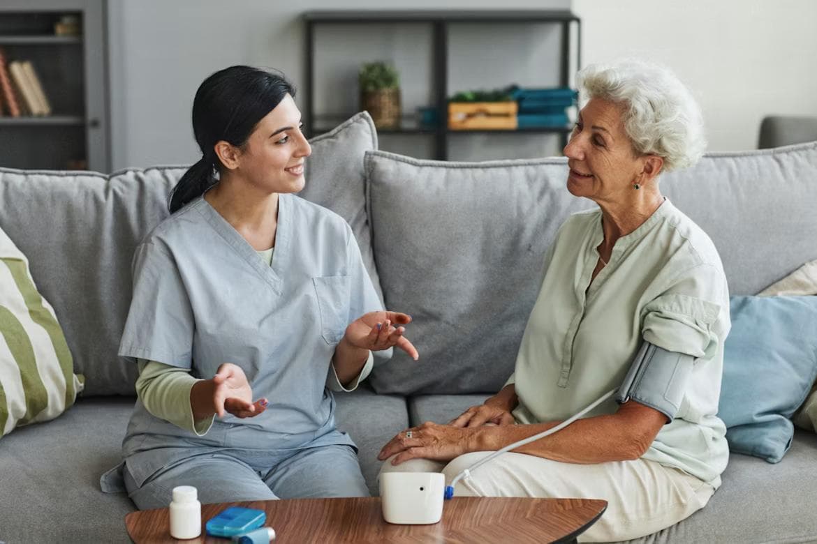 A LotusCare nurse with a client at home